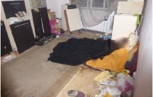 У Києві жінка з дитиною майже місяць прожили в квартирі з трупом матері (фото, відео)