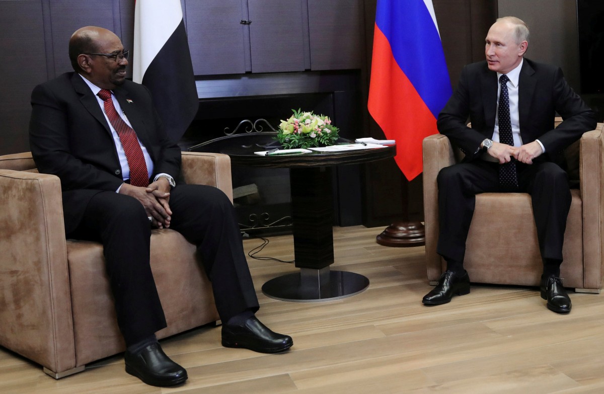 Омар Башир і Володимир Путін / REUTERS Омар Башир і Володимир Путін / REUTERS