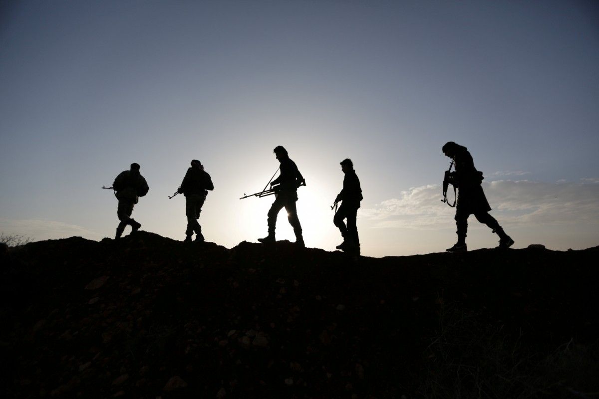 Вооруженные люди в Сирии, иллюстрация / REUTERS