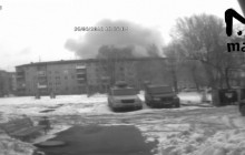 "Бурхливий вулкан над будинками": камери п'ятиповерхівки зняли пожежу в ТЦ у Кемерові (відео)