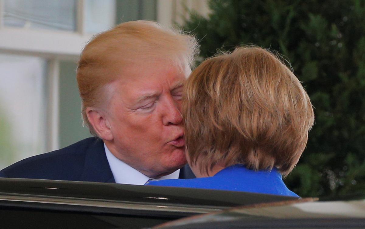 Дональд Трамп и Ангела Меркель / REUTERS