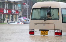 Потужні дощі накрили Пекін