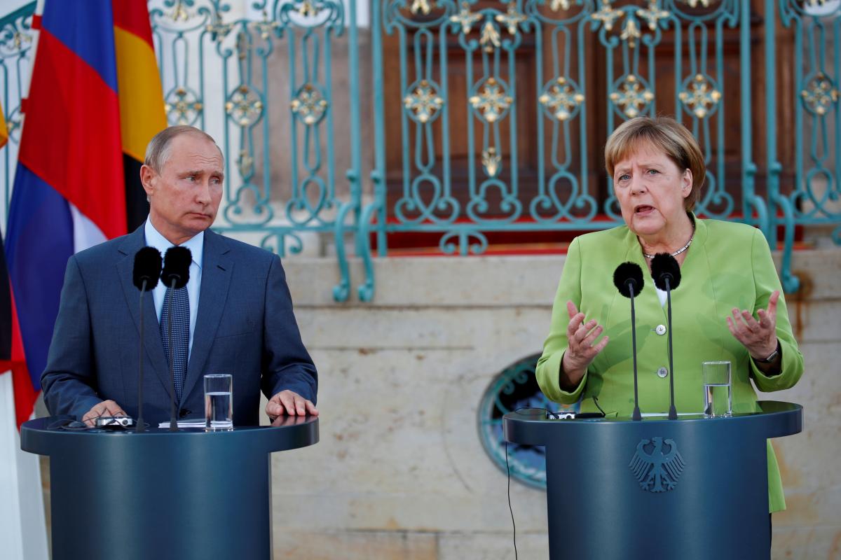 Владимир Путин и Ангела Меркель / REUTERS