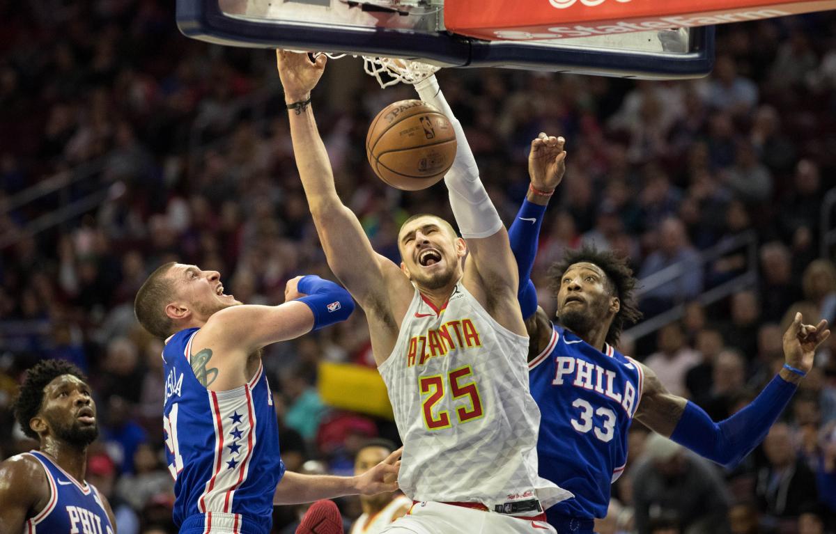 Украинец Алексей Лень в атаке / REUTERS