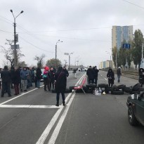 Angry Kyiv residents block motorway, rally against blackout in 2 apartment blocks