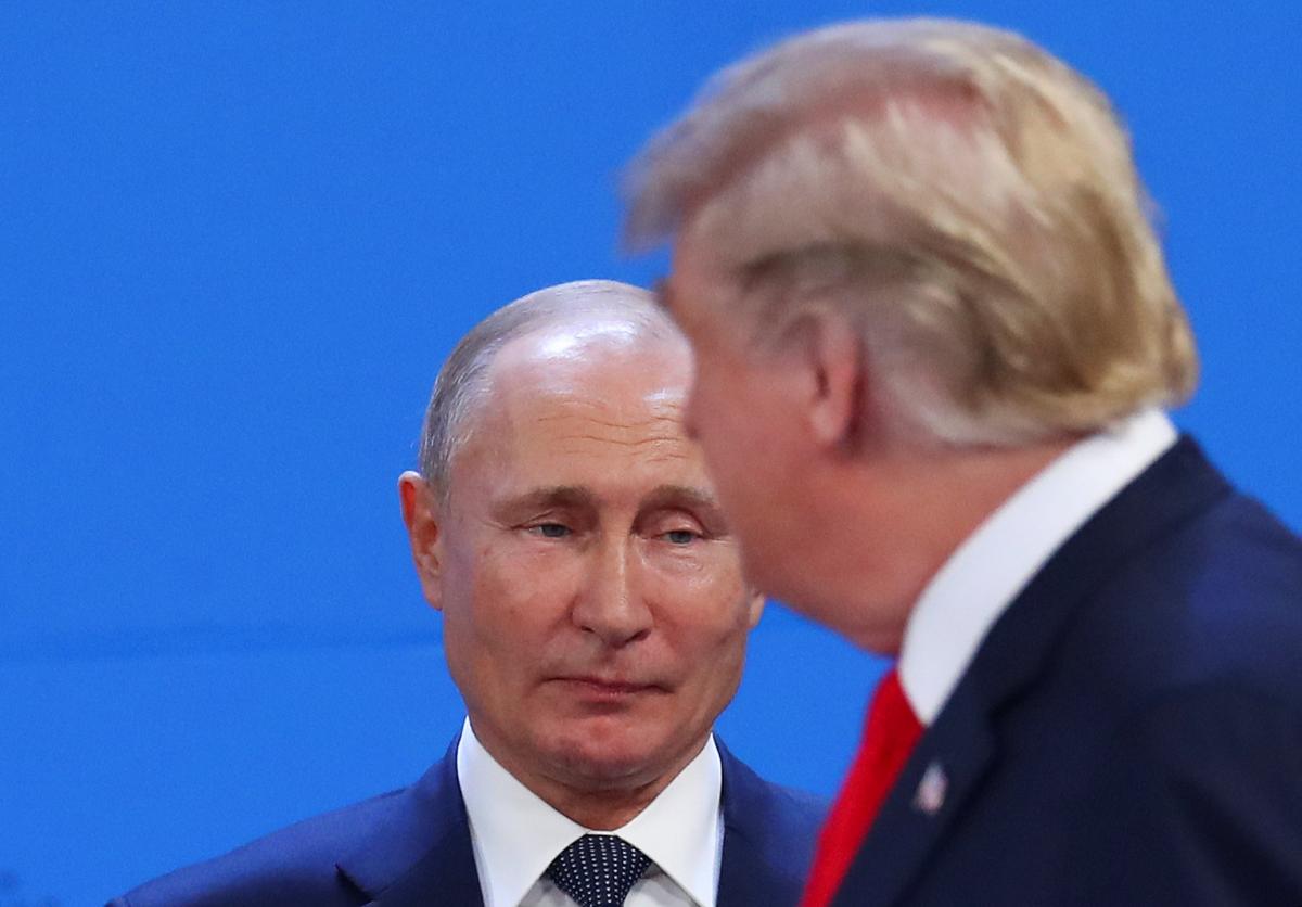   Donald Trump, in front of Vladimir Putin at the G20 / REUTERS 