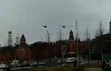 Раскрыта тайна загадочных полетов вертолетов Ми-8 над Кремлем, перевозящих людей в сетке (видео)
