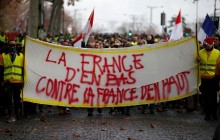 Победа "желтых жилетов": премьер Франции объявил о приостановке роста налогов на топливо (видео)