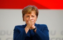 Merkel steps down as CDU leader (Photo, video)