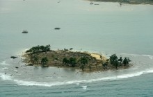 Reuters показало фото зруйнованих в результаті цунамі будинків і кораблів в Індонезії