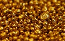 Reuters: Gold climbs to seven-year high on growth fears, stimulus measures