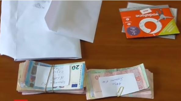 Зароблені гроші псевдоекстрасенси виводили на електронні рахунки / скріншот відео ТСН Зароблені гроші псевдоекстрасенси виводили на електронні рахунки / скріншот відео ТСН