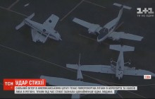 Як паперові: ураганний вітер поперевертав літаки в американському аеропорту (відео)
