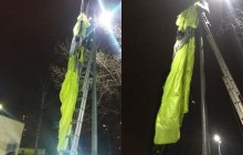 У Києві парашутист стрибнув з даху багатоповерхівки і повис на ліхтарному стовпі (фото)