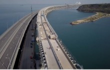 Russian occupation forces to open railway traffic on Kerch Strait Bridge on Dec 9-10 – media