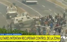 Протестующих в Венесуэле начали давить бронеавтомобилями (видео 18+)