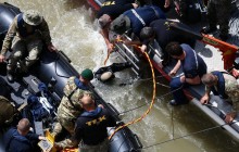 Reuters: Four bodies found as salvage crews lift capsized Hungarian boat