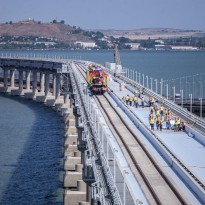 Russian occupation forces build first rail track on Kerch Strait Bridge (Photo)