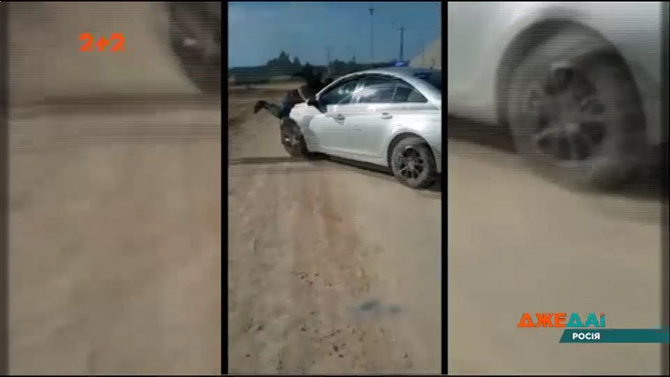 Жінка напала на полісменів та завдала одному з них травм / скріншот Жінка напала на полісменів та завдала одному з них травм / скріншот