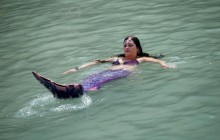 Кому радість, а кому страждання: як туристи переживають пекельну спеку в Європі (фоторепортаж)