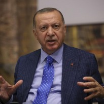 RFE/RL: Turkey's Erdogan warns Europe of new Syrian migrants, awaits Russian talks