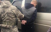 На Київщині пенсіонер МВС намагався відбити у поліцейських затриманого за розбій