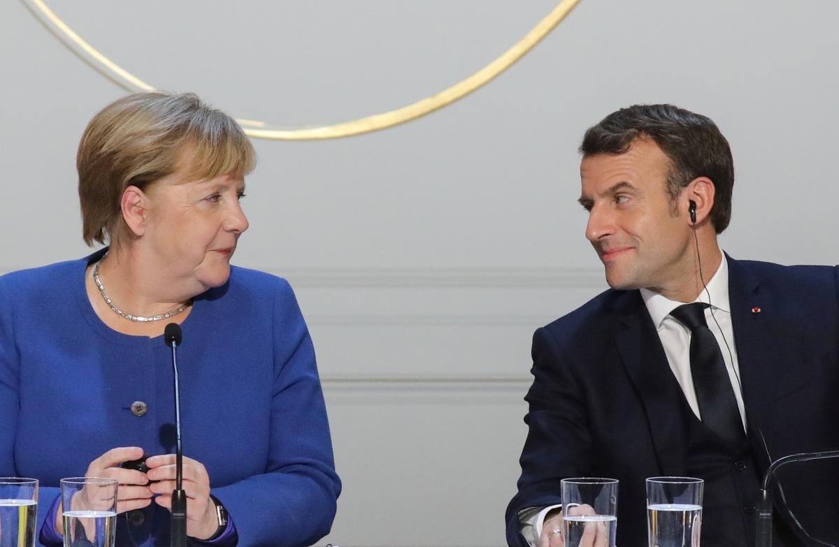 Лидеры Германии и Франции Ангела Меркель и Эмманюэль Макрон / REUTERS