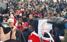 В Минске на акции против интеграции с Россией порвали портреты Путина (фото, видео)