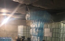 В Харькове полиция обнаружила гаражный бокс, в котором нелегально тоннами разливали спирт (фото)