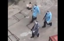 Чистильники: у китайському Ухані помітили озброєні патрулі в медичних халатах