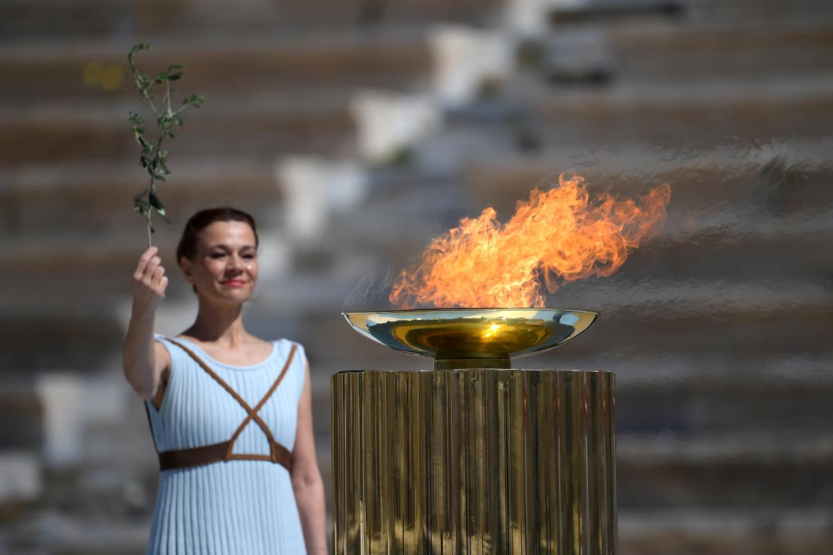 Церемонія передачі олімпійського вогню / REUTERS Церемонія передачі олімпійського вогню / REUTERS