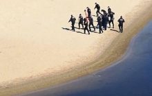 Карантин у Києві: суд виправдав плавця, якого з десяток поліцейських ловили в Гідропарку (відео)