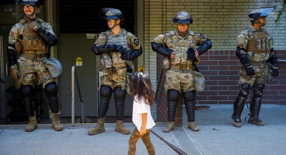 Volunteers cleaning up after riots in Bellevue, U.S. Photoreport