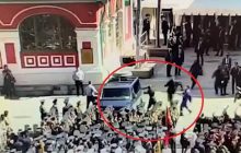 На параде у Путина российский военный атаковал автомобиль с охранниками (фото)