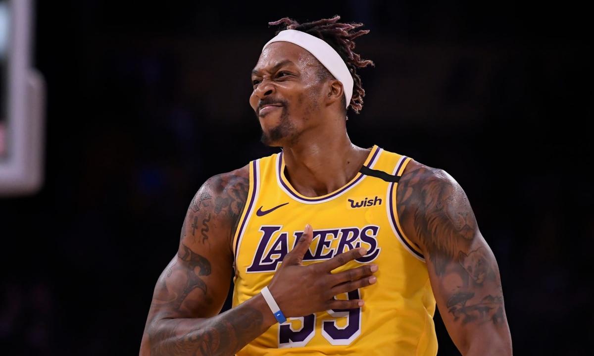 Дуайт Ховард совершил слишком мощный данк / фото lakersnation.com Дуайт Ховард совершил слишком мощный данк / фото lakersnation.com