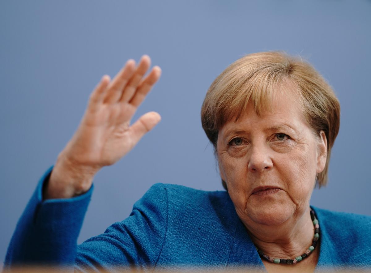 Merkel, Biden call on Russia to withdraw troops from Ukraine's border / REUTERS
