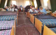 Боевики не пускают: на КПВВ "Новотроицкое" 14 человек продолжают жить в палатках (фото)