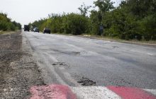 За полгода километр асфальта: Ozaltin не смогла отремонтировать трассу М-18 - СМИ