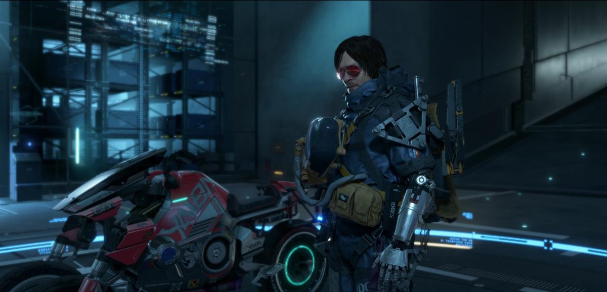 Главный герой Death Stranding получил протез руки и трицикл из Cyberpunk 2077 / фото Kojima Productions Главный герой Death Stranding получил протез руки и трицикл из Cyberpunk 2077 / фото Kojima Productions