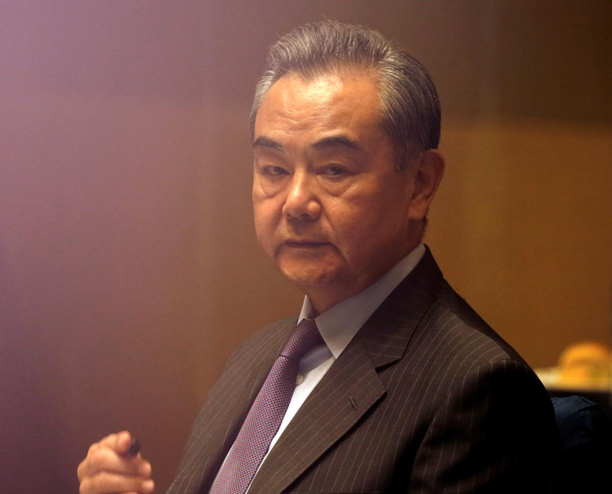 Wang Yi: Beijing will continue to work for peace / photo REUTERS