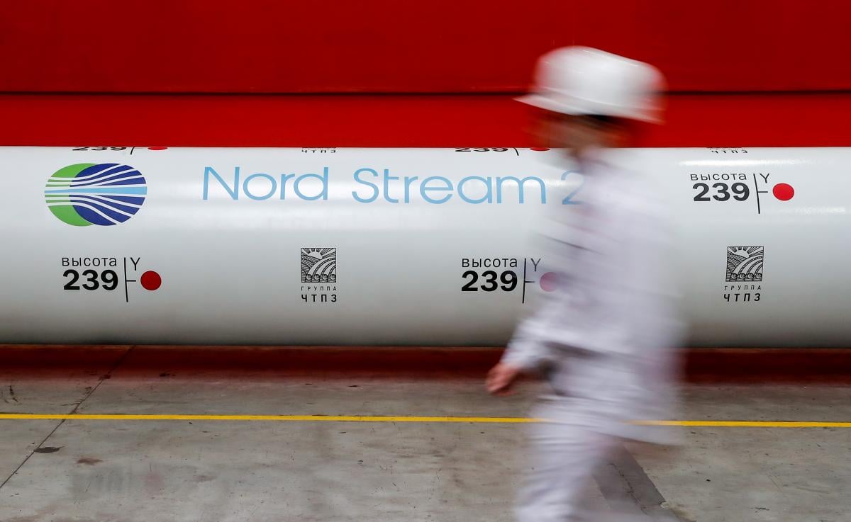 German Chancellor Olaf Scholz considers Nord Stream 2 a joint commercial project / Illustration REUTERS