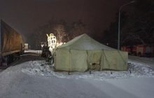 На въездах в Киев обустроили пункты обогрева для водителей (фото)