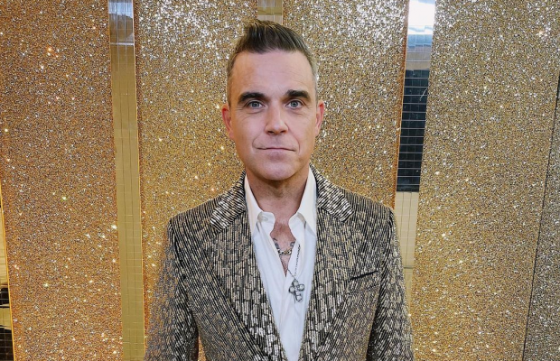 Режиссер "Величайшего шоумена" снимет биографический фильм о Робби Уильямсе