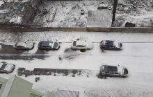 Зима не отступает: Киев накрыл мощный снегопад (фоторепортаж)