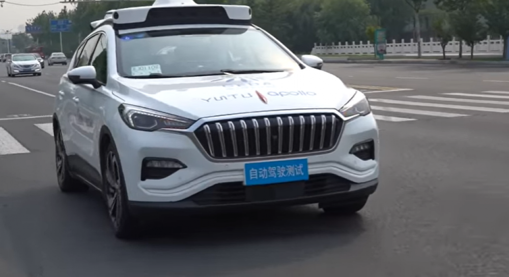 Китайцы создали гибрид робота и электромобиля (видео) — УНИАН