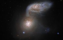 Hubble сделал фото галактик, которые слились в нежном танце