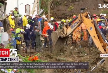 В Колумбии после сильного оползня ищут тех, кто мог выжить под грязью