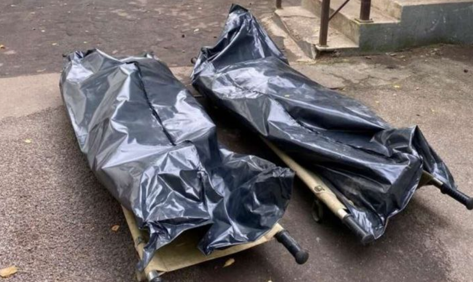 Трупи ліквідованих росіян в пакетах завантажують у рефрижераторні вагони / фото "РІА Мелітополь" Трупи ліквідованих росіян в пакетах завантажують у рефрижераторні вагони / фото "РІА Мелітополь"