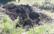 На Харківщині знайшли поховання військових РФ, серед них - підполковник (фото)