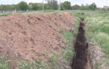Манипулируя заявлениями об эпидемии оккупанты расширяют братские могилы в Мариуполе